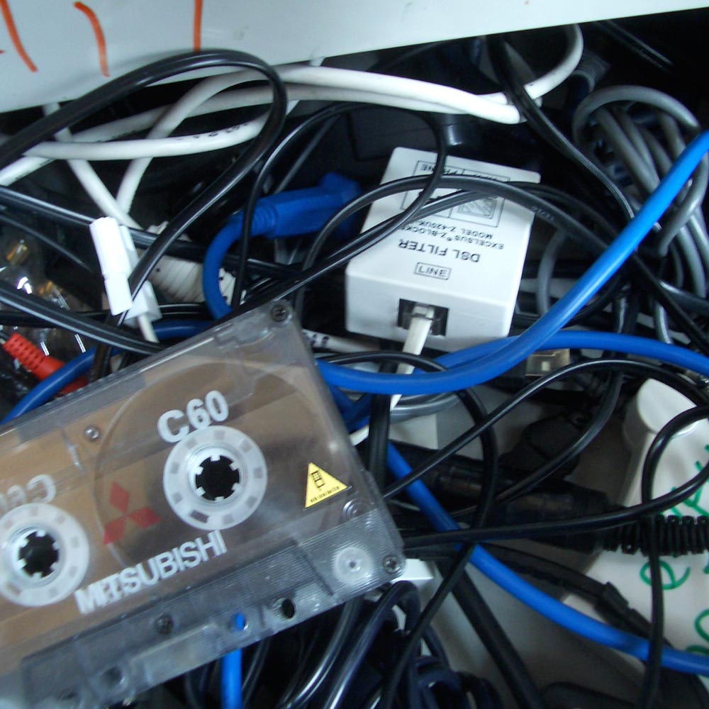 An 'Obsolete' warning sticker, reading: I can't play my tapes anymore